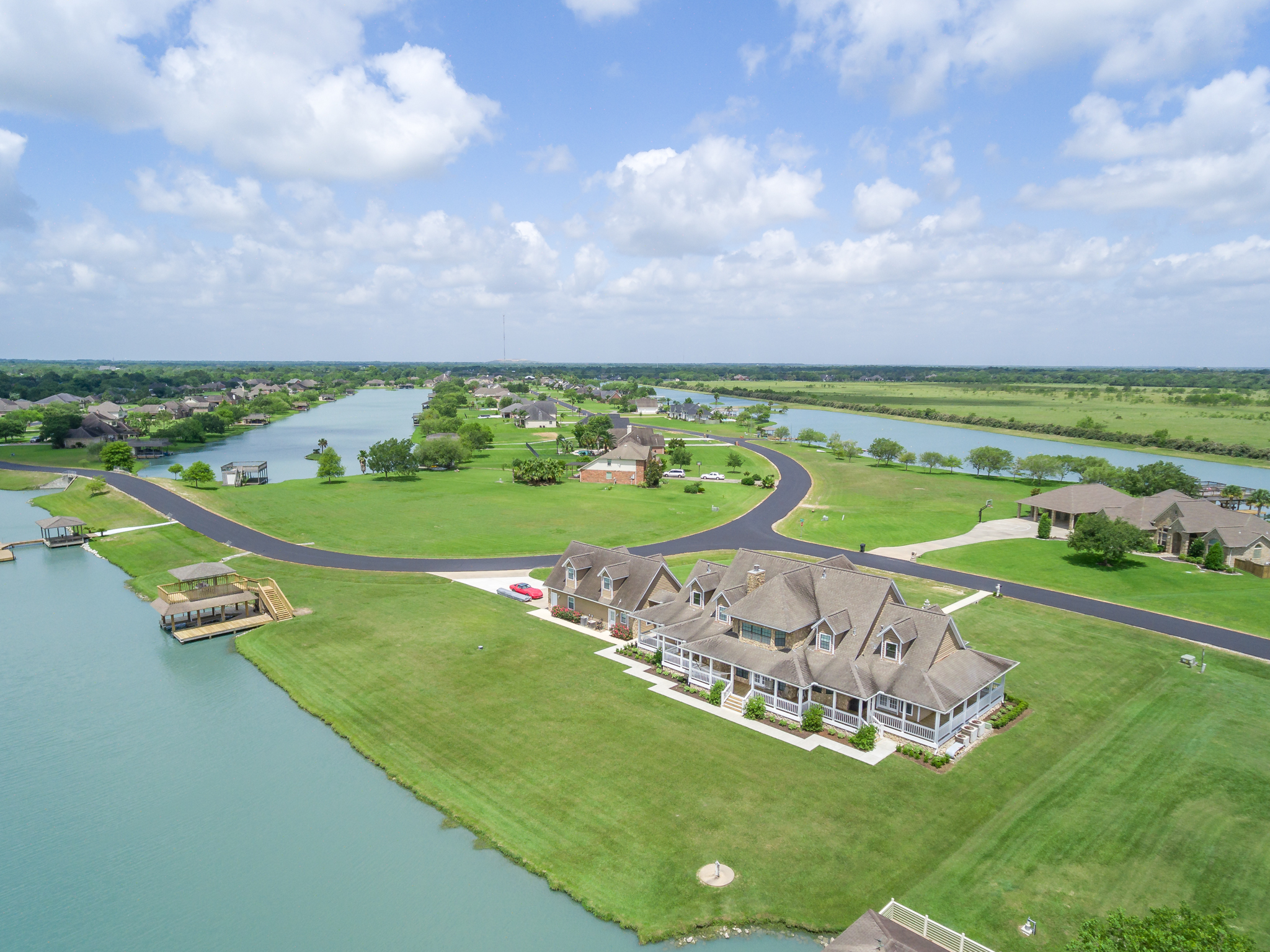 Aerial view of a Lago Santa Fe waterfront estate on the lake